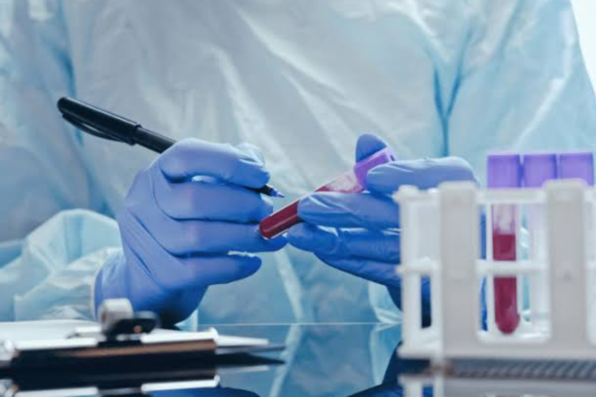 Doctor reviewing cancer screening test reports